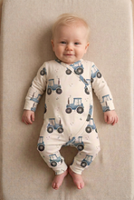 Load image into Gallery viewer, Blonde baby wearing the approved tractor romper