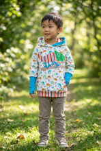 Load image into Gallery viewer, Boy outdoors wearing the chameleon hoodie