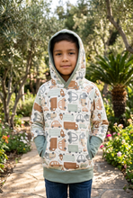 Load image into Gallery viewer, Older boy outdoors wearing a neutral car-print hoodie