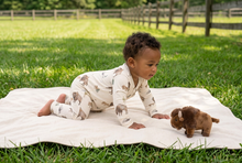 Load image into Gallery viewer, Baby boy crawling outdoors toward a buffalo plush
