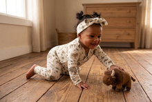 Load image into Gallery viewer, Baby girl crawling toward a buffalo plush in a farmhouse
